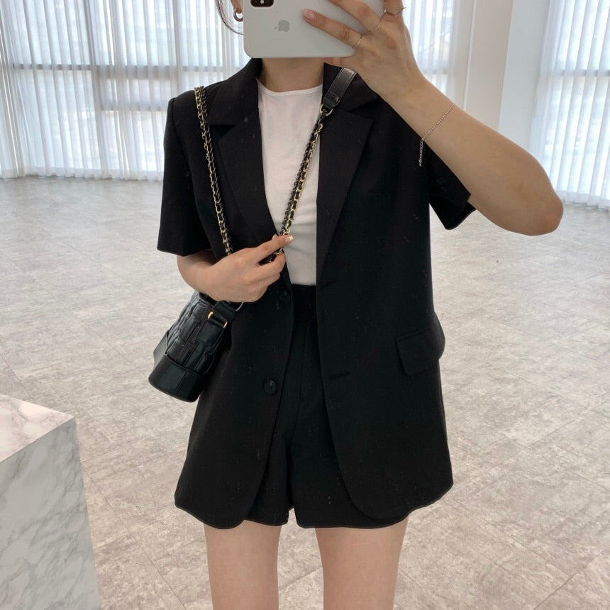 black blazer and shorts outfit